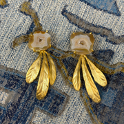 Circular Light Brownish Stone with 3 Feathers Dangling